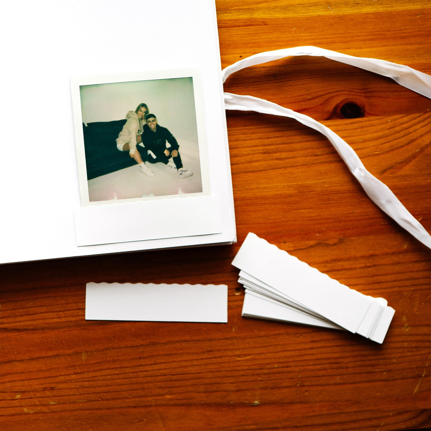 Premium photography pocket for Polaroids, designed for safe storage in albums. Ideal for preserving cherished memories, this high-quality, protective sleeve ensures your photos remain pristine and securely displayed.